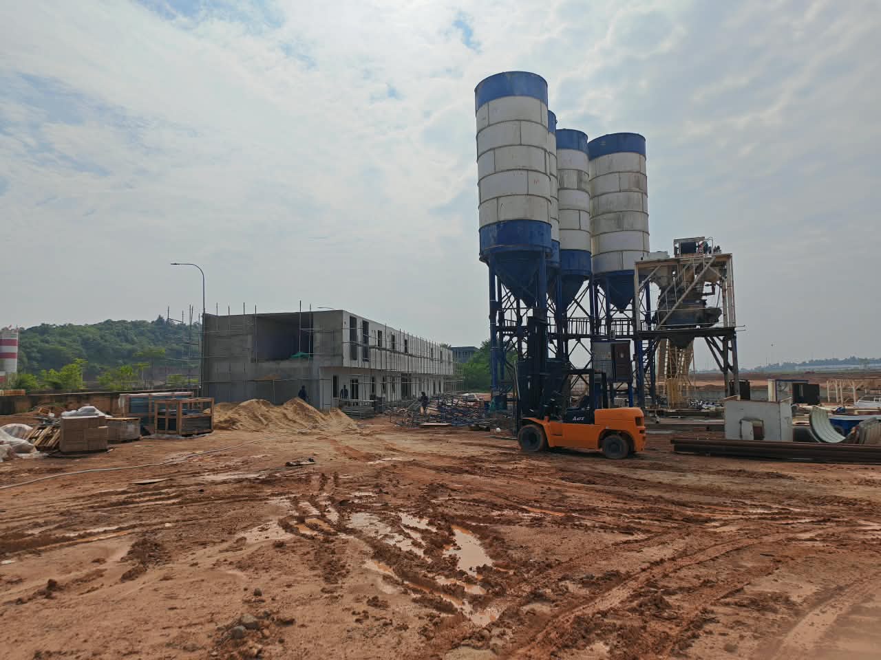 Concrete batching silos and equipment at a construction site
